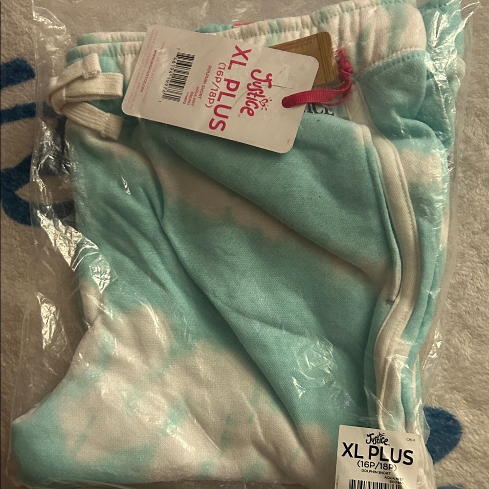 Justice Kids Aqua and White dolphin shorts 16/18 plus size